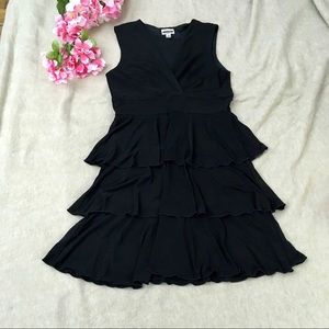 Surplice Front Sleeveless Three Tiered Little Black Dress